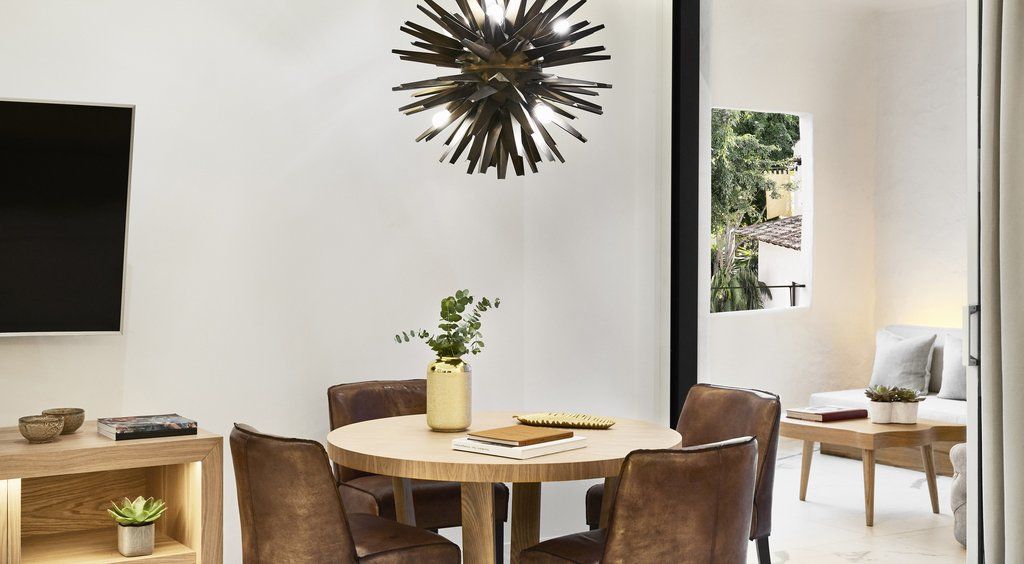 Nobu Hotel Marbella (Adults Only) Exterior foto A dining room with a modern light fixture
